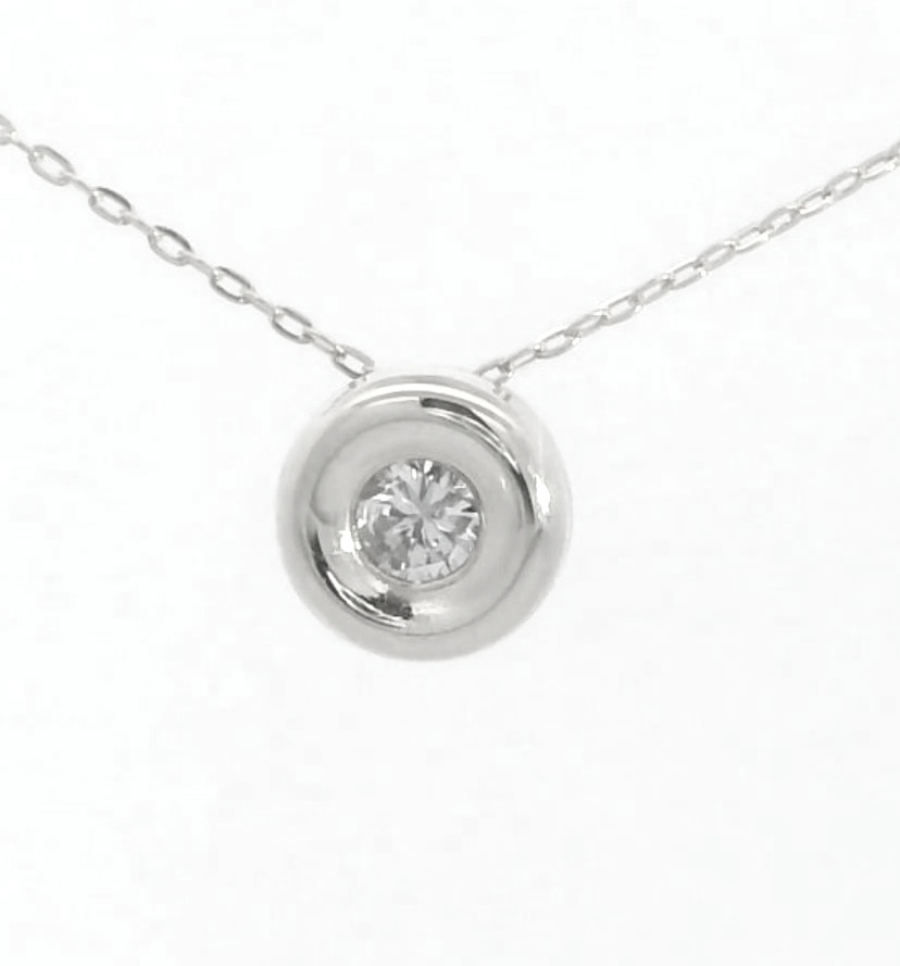 COLGANTE CHATON ORO BLANCO ESTAMPACION  5MM.BRILLANTE H-SI 1. 0.05 CT