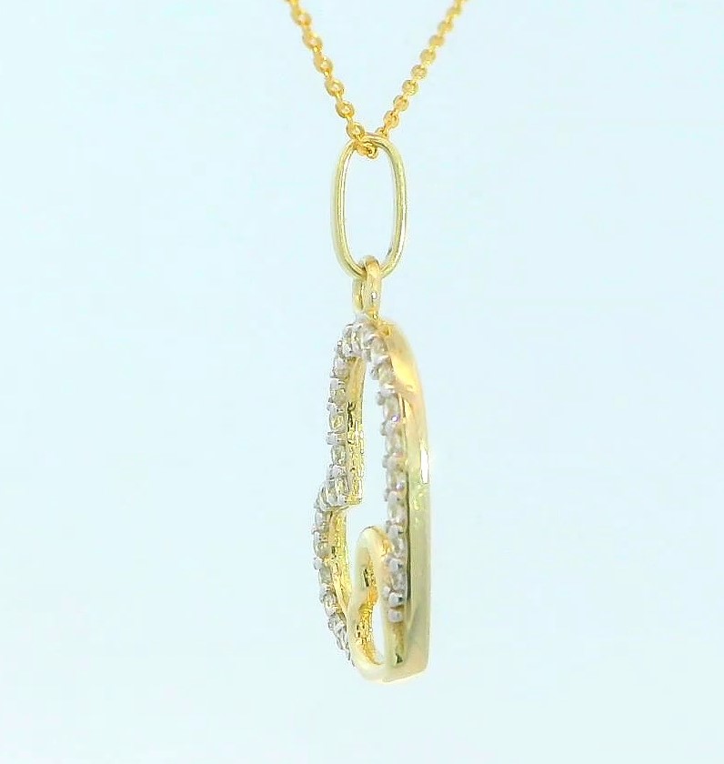 COLGANTE DOS CORAZONES CON CIRCONITAS. 9KILATES.14x13MM