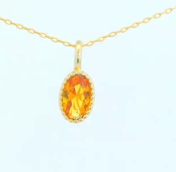 COLGANTE OVAL 6x4MM COLOR CITRINO.9 KILATES